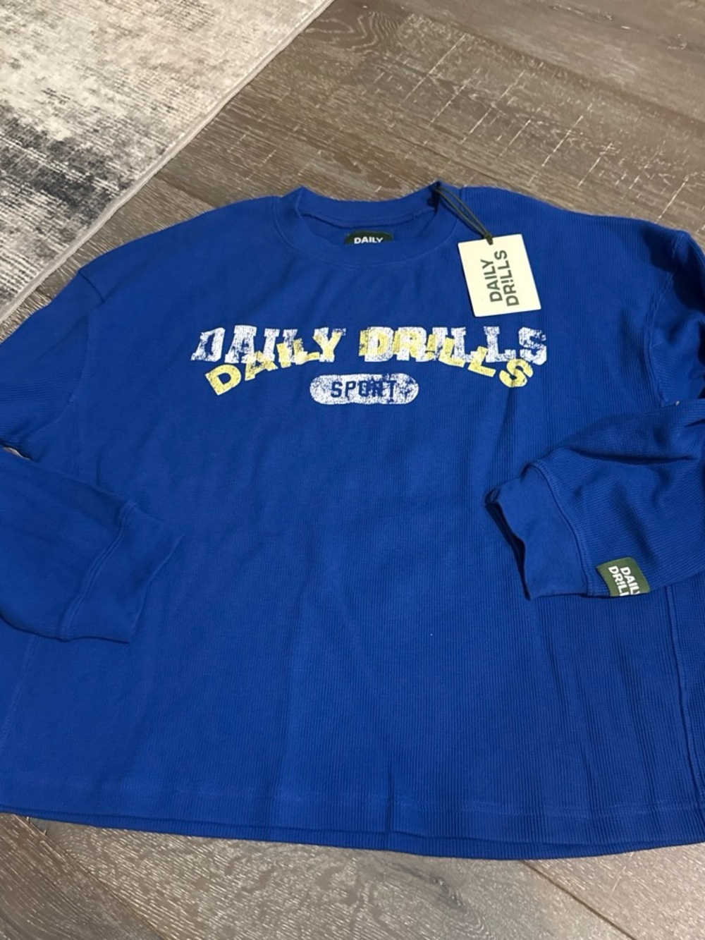 Daily Drills Blue Top with Green Logo Patch
